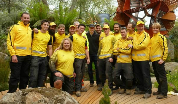 Prince Harry with Mick centre. The team had a visit from Prince Harry during construction today!